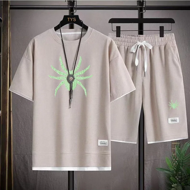 thumbnail image 1 of Conjunto deportivo informal de marca de moda de verano para hombre con pantalones cortos holgados de manga corta y cuello redondo, conjunto de dos piezas con diseño de gofre, conjunto de versión corea, 1 of 5