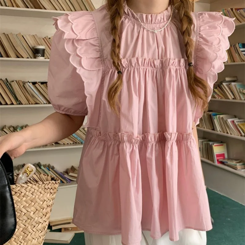 รูปสินค้า เสื้อเชิ้ตแขนสั้นสีขาว ดีไซน์จีบด้านหน้า ใส่ได้ทุกโอกาส
