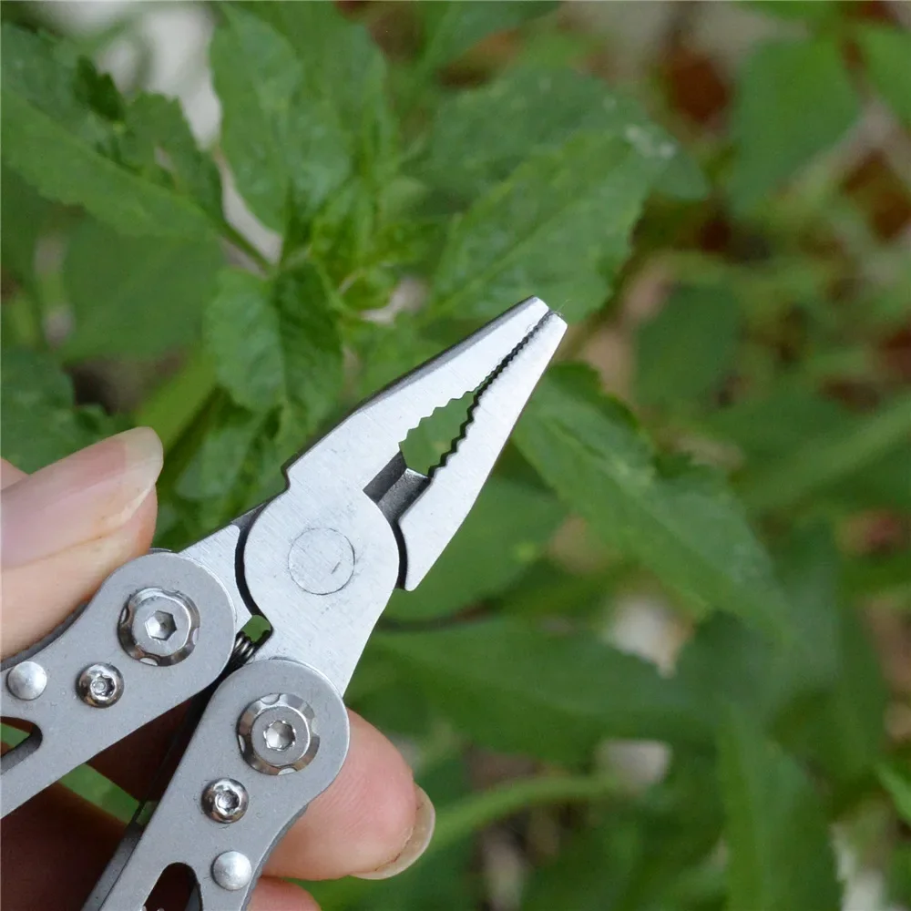Description Picture 6 of itemMultifunction Folding Pliers Pocket Knife Outdoor Camping Survival Hunting Foldable Multi Tool Scissors Saw Screwdriver Clip Set