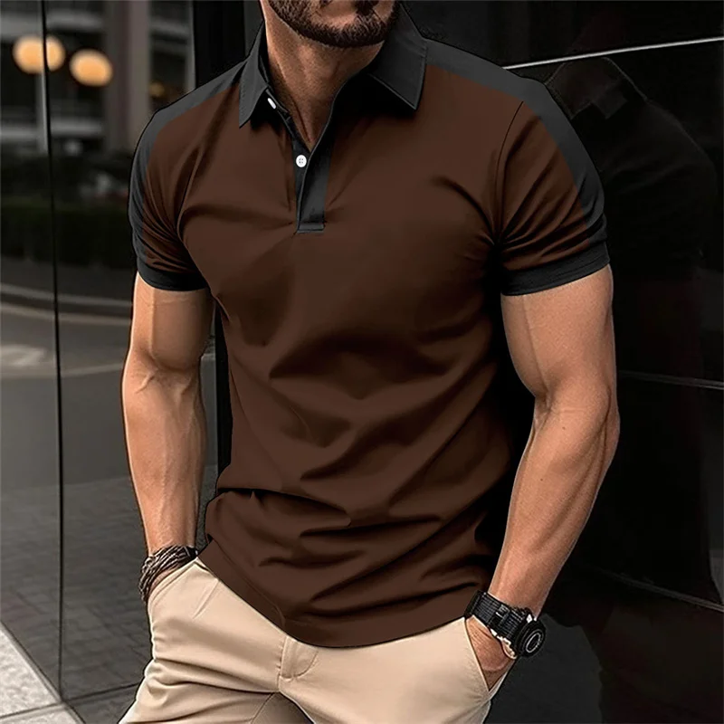 Man wearing a 6XL short sleeve patchwork polo with bold 3D print, standing confidently in a sunny urban setting with sneakers and shades brown