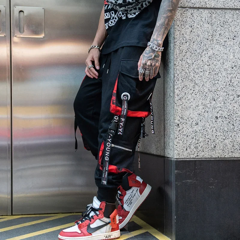 

Men Hip Hop Black Cargo Pants joggers Sweatpants Overalls Men Ribbons Streetwear Harem Pants Women Fashions Trousers