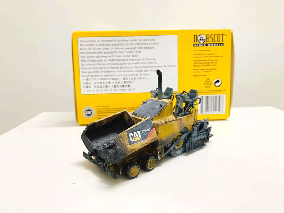 AP600D Asphalt Paver Muddy Edition 1:50 Scale DieCast Metal