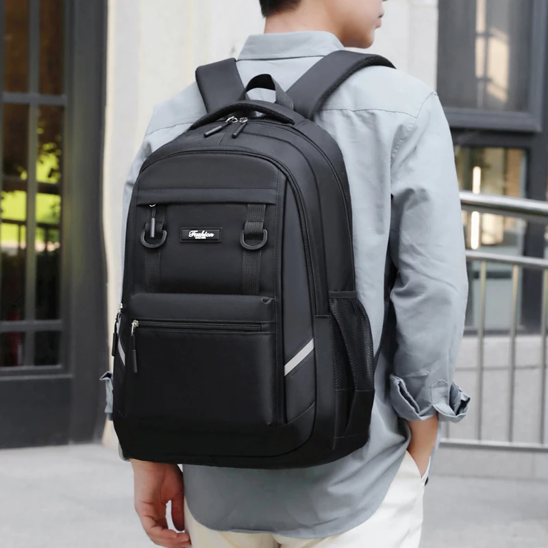 Stylish large-capacity backpack with multiple pockets, equipped with a laptop compartment and adjustable shoulder straps, perfec