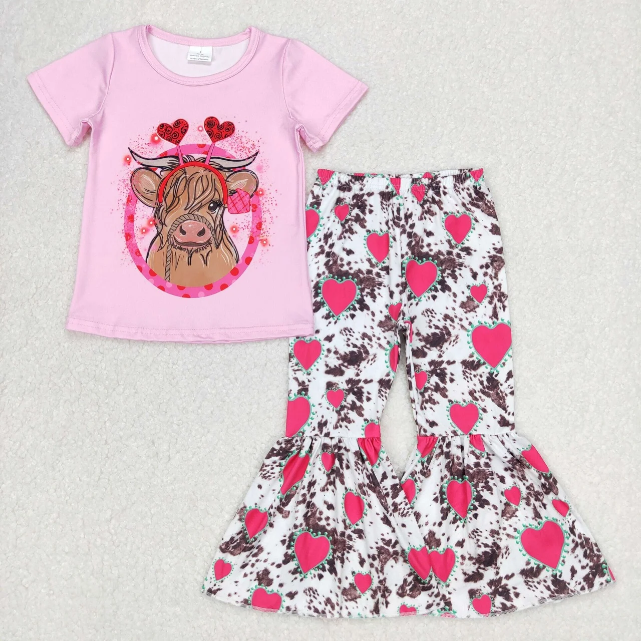 

Оптовая продажа, Детский комплект на День святого Валентина, розовая рубашка с короткими рукавами для малышей, наряд для маленьких девочек с сердечками, штаны с коровьим принтом и колокольчиками, одежда