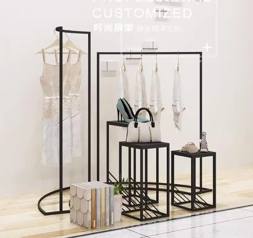 

Clothing store display rack, island display cabinet, women's clothing store simple high and low showcase window stand, floor to