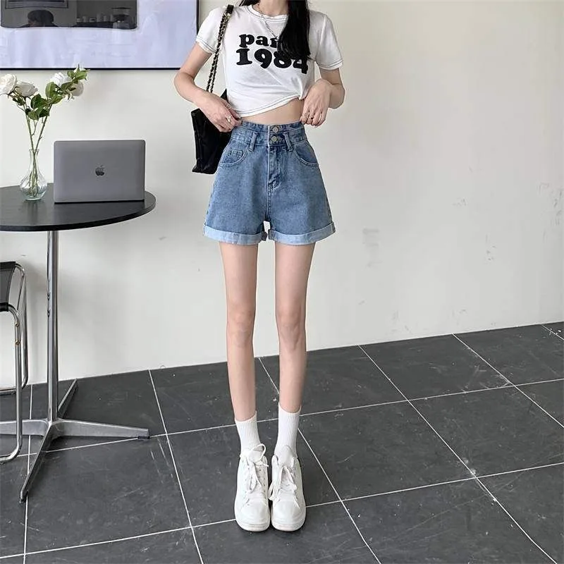 High-waist denim shorts back view