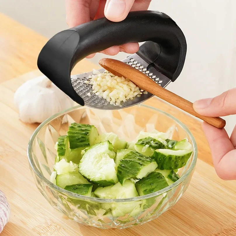 &middot; Free returns within 90 days, no questions asked Stainless Steel Garlic Press Crusher Manual Garlic Mincer Chopping Too
