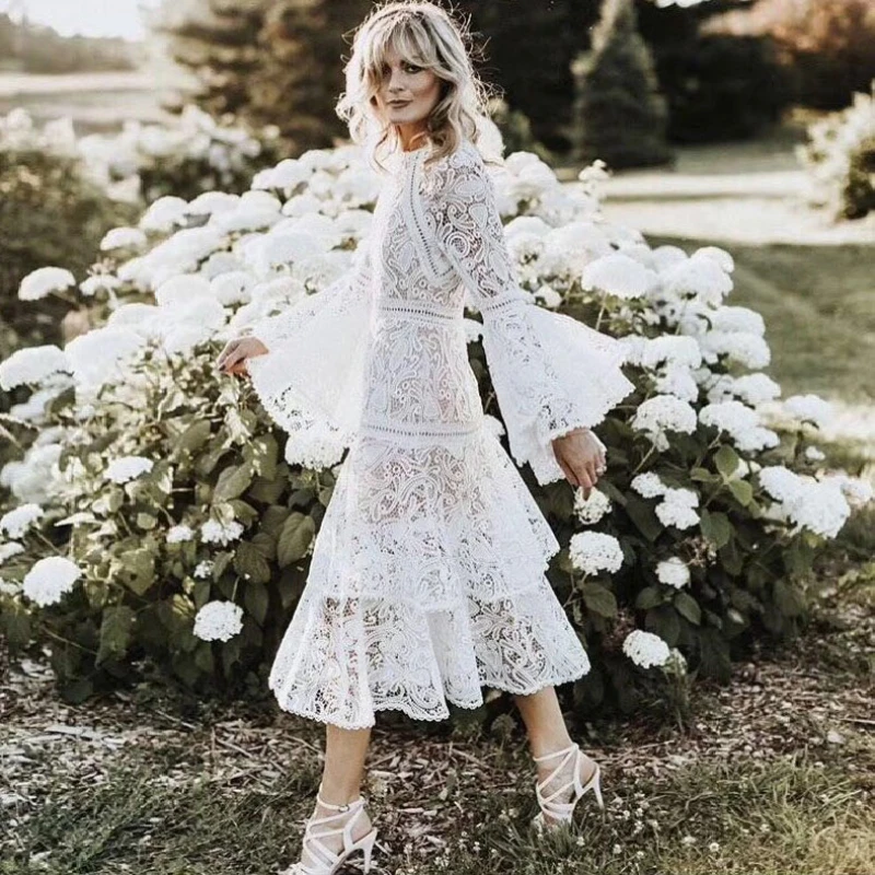 Vestidos de encaje y chiffon con mangas largas y bolsillos Tormenta