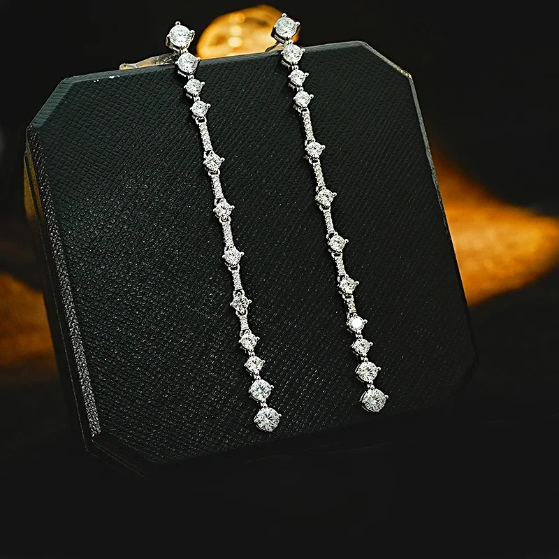 

Light Luxury Tassel Lingdong 925 Silver Long Earrings Set with High Carbon Diamond Versatile Retro Style