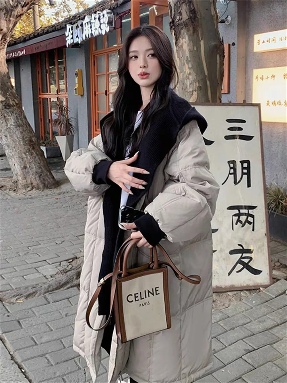 Рисунок 5 - Женский зимний пуховик средней длины