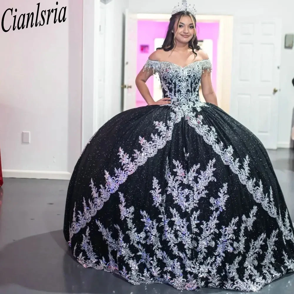 

Black Glitter Crystal Tassel Ball Gown Quinceanera Dresses Off The Shoulder Silver Appliques Ruffles Corset Vestidos De XV Años