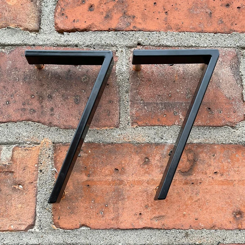 Sample black zinc alloy house number shown up close