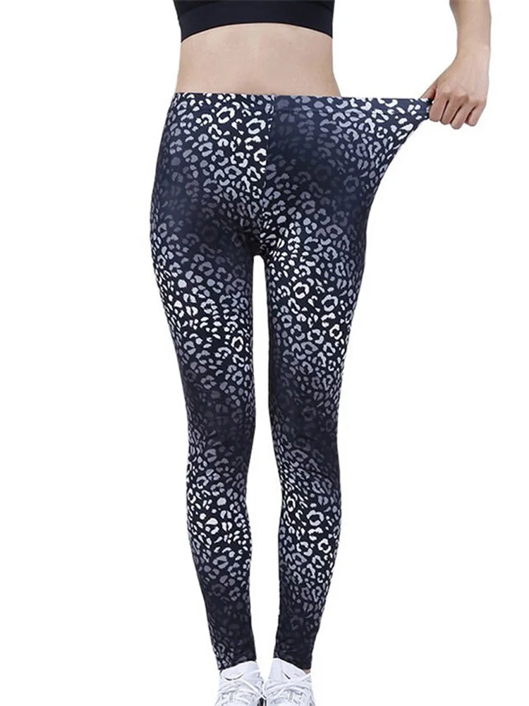 Women's Plus Size Active Leopard Print Workout Leggings. • Flat high rise  waistband smoothes & supports the tummy • Hidden waistband pocket for keys,  phone, cash • Vibrant cheetah print • 4-way