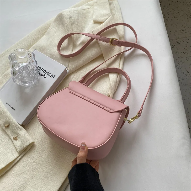 Candy colored bag 2024 spring/summer new women's high-end texture niche design casual handheld one shoulder crossbody saddle bag