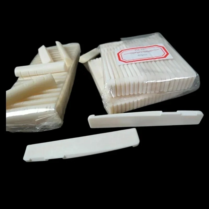 

40 шт. седлов для акустической гитары и 40 шт. 12-струнных орехов с прорезью DJ-15/16