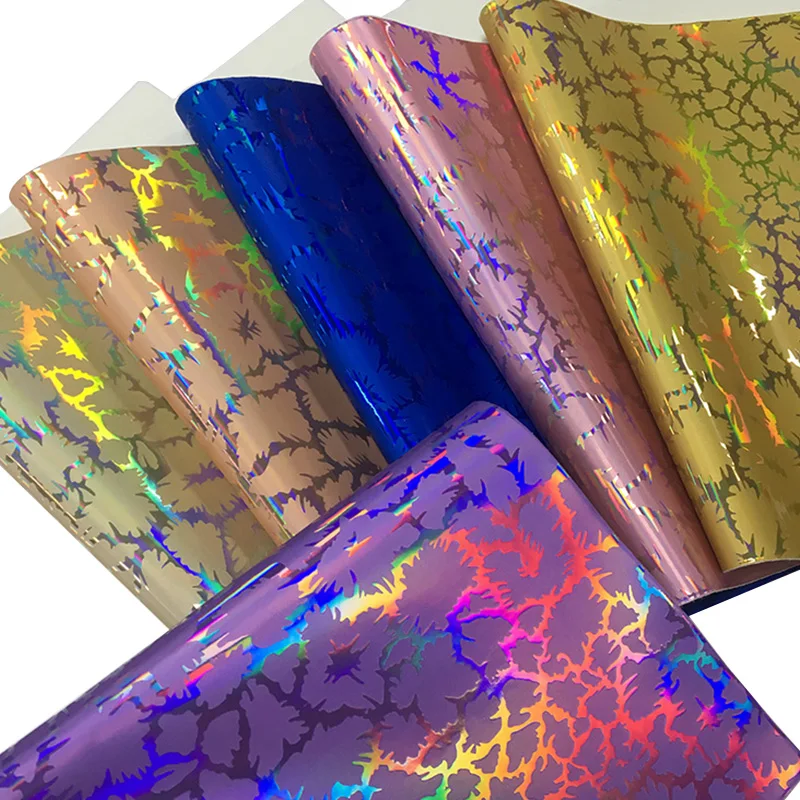 

Holographic Pattern Embossed PU Metallic Laser Faux Leather Fabric Sheet for Making Shoe/Bag/Handbag/Decoration/Craft 46x135cm