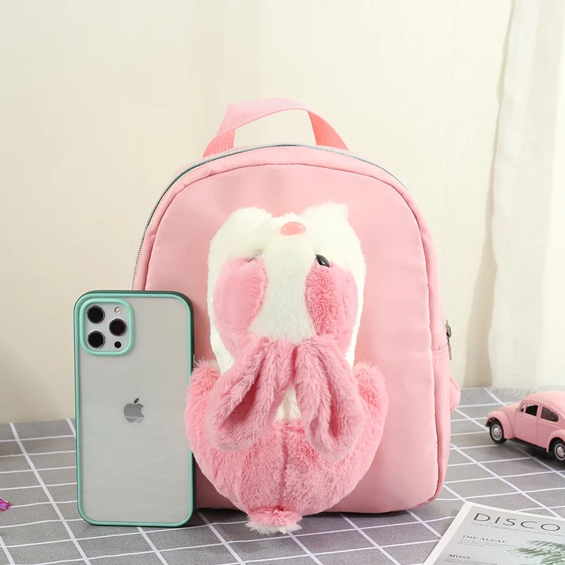 Рисунок 6 - Милые маленькие рюкзаки с куклой