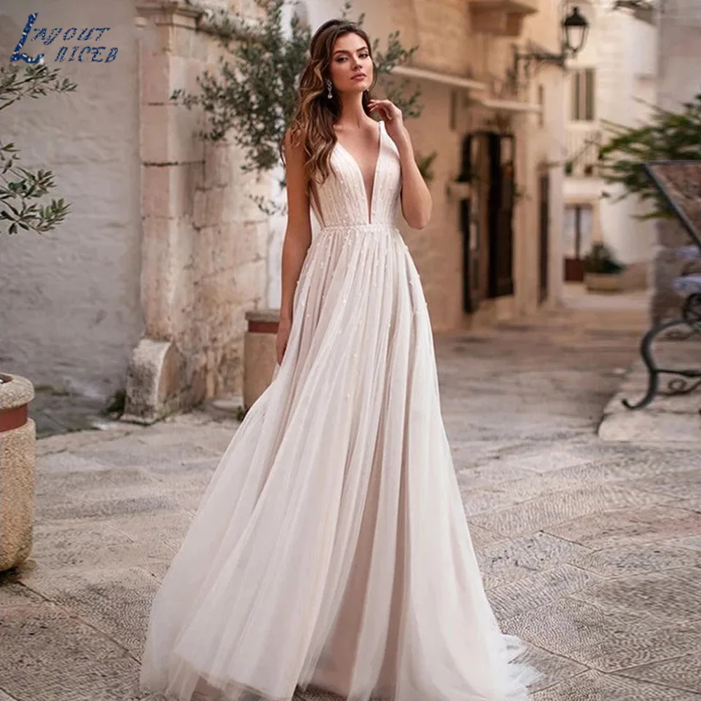 

LAYOUT NICEB Civil Deep V Neck Wedding Dresses 2023 Sexy Spaghetti Strap Button Beach For Bridal Gowns Open Back Bride Dresses