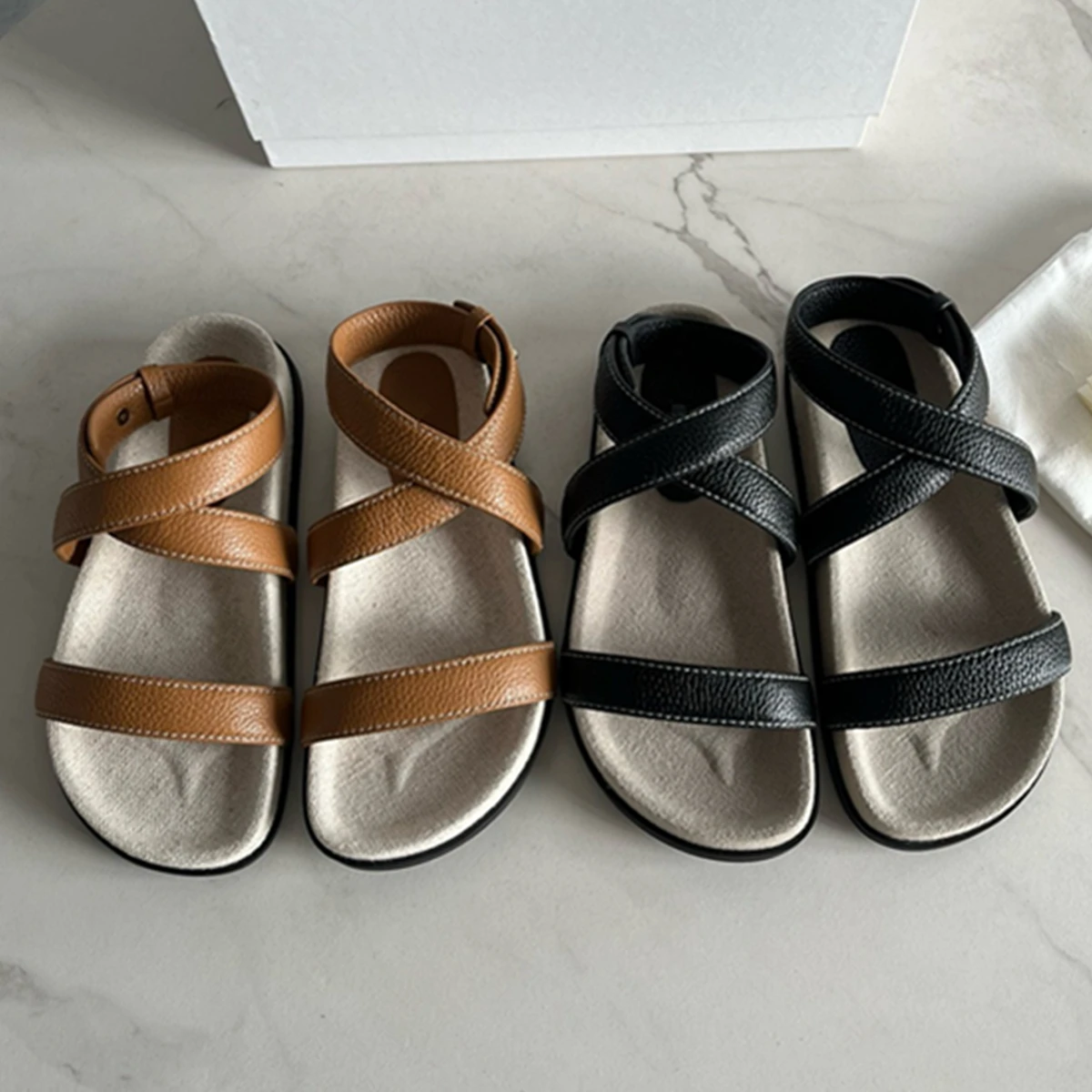 

Maxdutti Minimalist Flat ShoesWomen CowhideVintage Roman Retro Flat Vacation Sandals Summer Lychee Cross Strap Sandals
