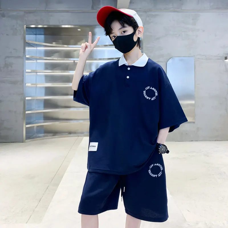 

Boys New Summer Solid Color Suit Kids Short Sleeve Korean T-shirt + Shorts 2pcs Loose Casual Outfits for Teenager Clothing Sets