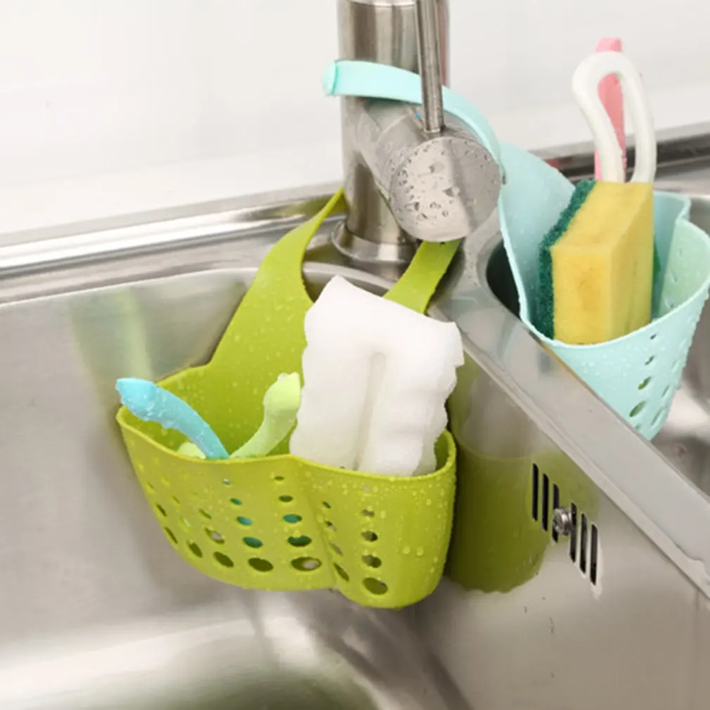 https://ae01.alicdn.com/kf/S0226bedb6dc04e81a814c15ce8b2c335Y/Kitchen-Accessories-Utensils-Organizer-Adjustable-Snap-Sink-Soap-Sponge-Holder-Kitchen-Hanging-Drain-Basket-Kitchen-Gadgets.jpg