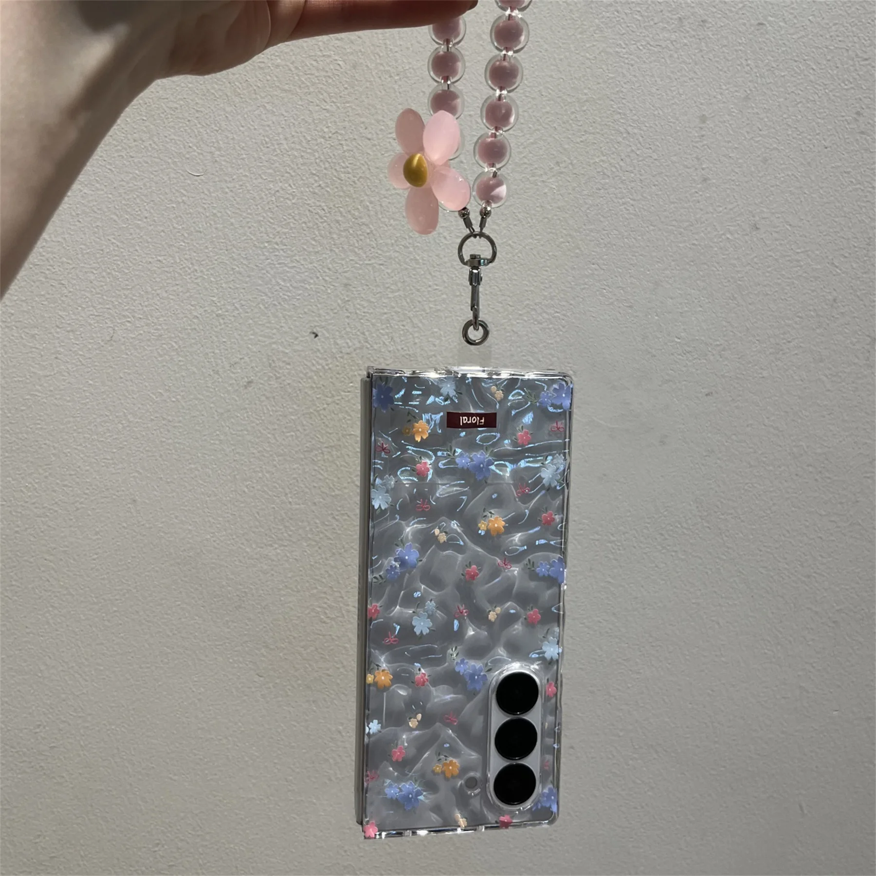 Cute Blue Floral Transparent Phone Case with Flower Chain Accents