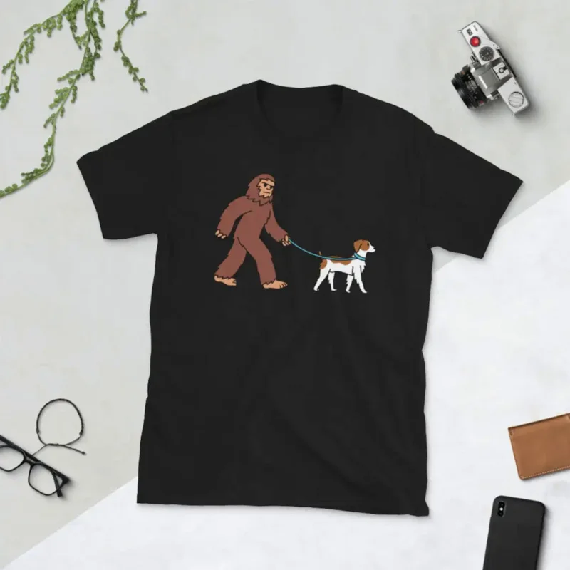 

Bigfoot Sasquatch Walking Brittany Spaniel T-Shirt Dog Shirt Funny Gift