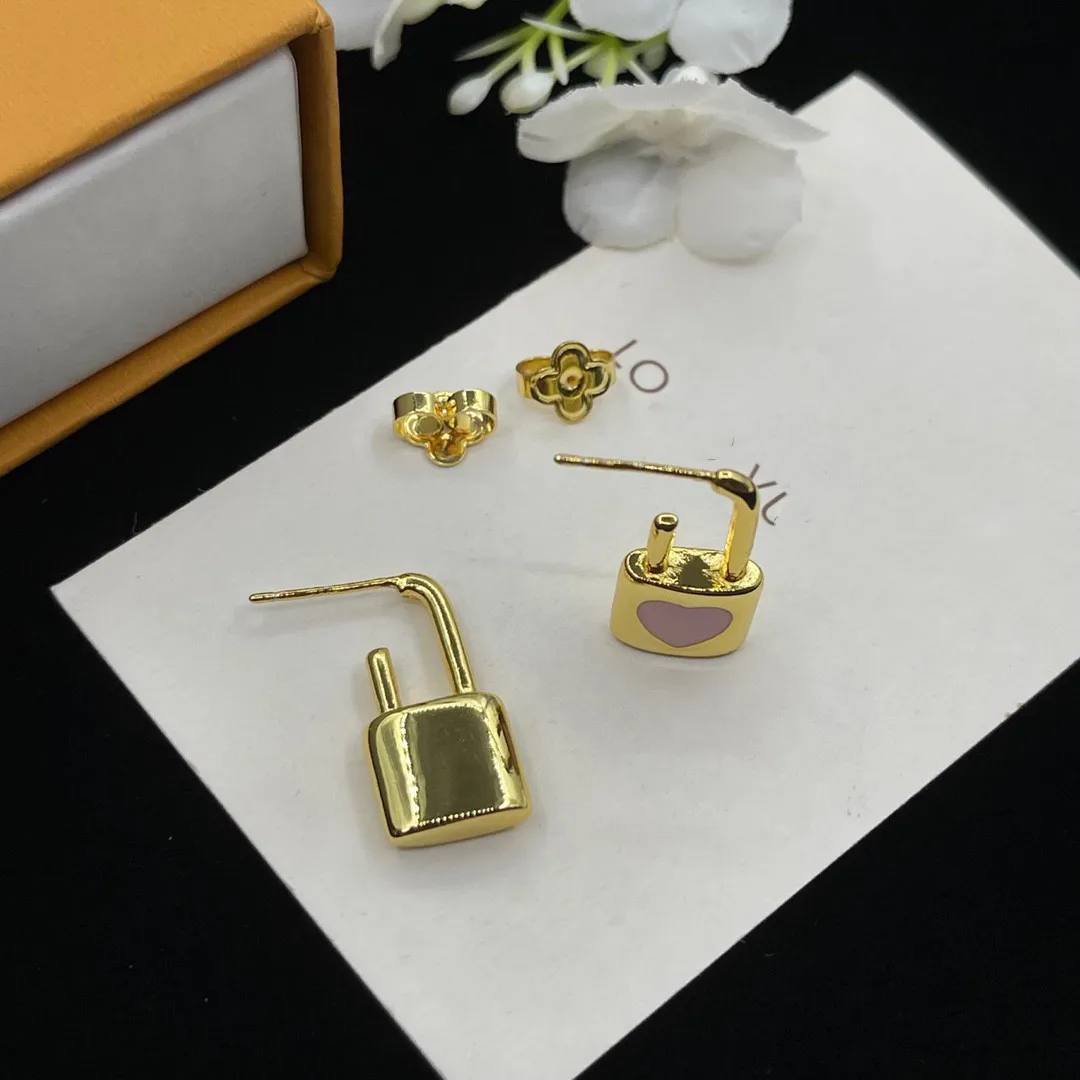 

European and American fashion love lock head earrings
