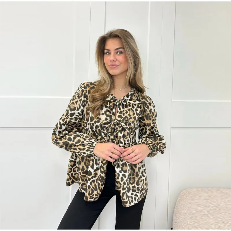 S025d180b1b584e828f8ccc118a98547fQ Fashion Leopard Print Bow Women Shirts Casual Long Sleeve O-neck Lace Up Blouses Spring Summer Retro Hollow Out Female Top Mallzona