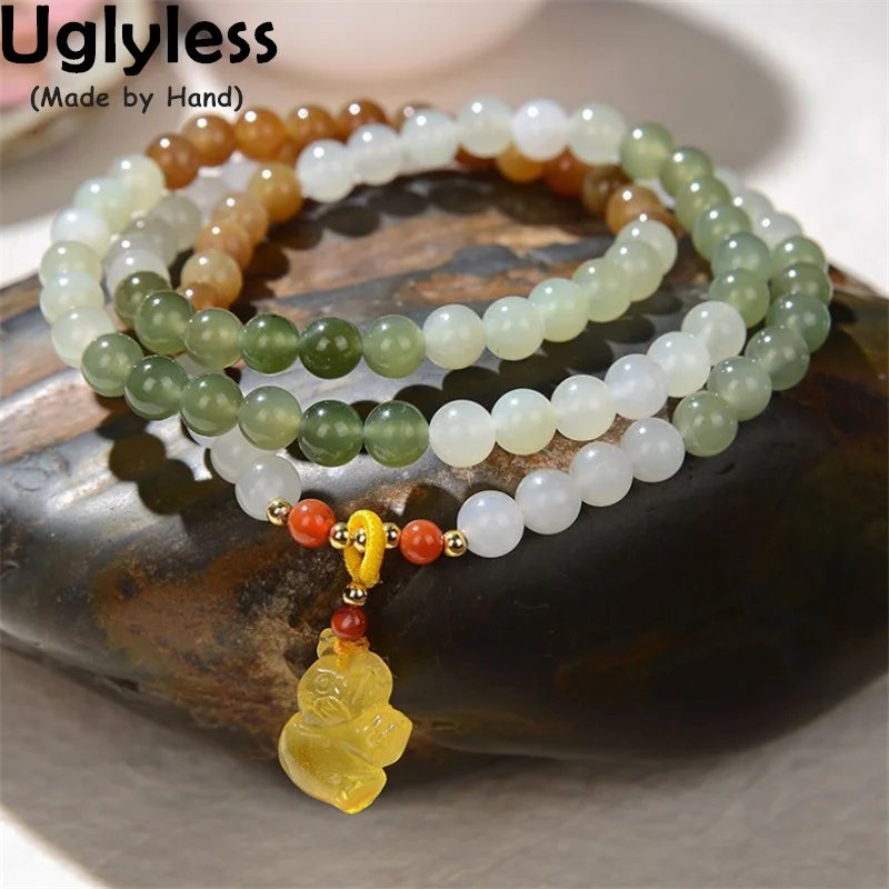 

Uglyless Natural Candy Colors Hotan Nephrite Jade Bracelets for Women Elastic Rope 3 Layers Gemstones Bracelets Amber 925 Silver