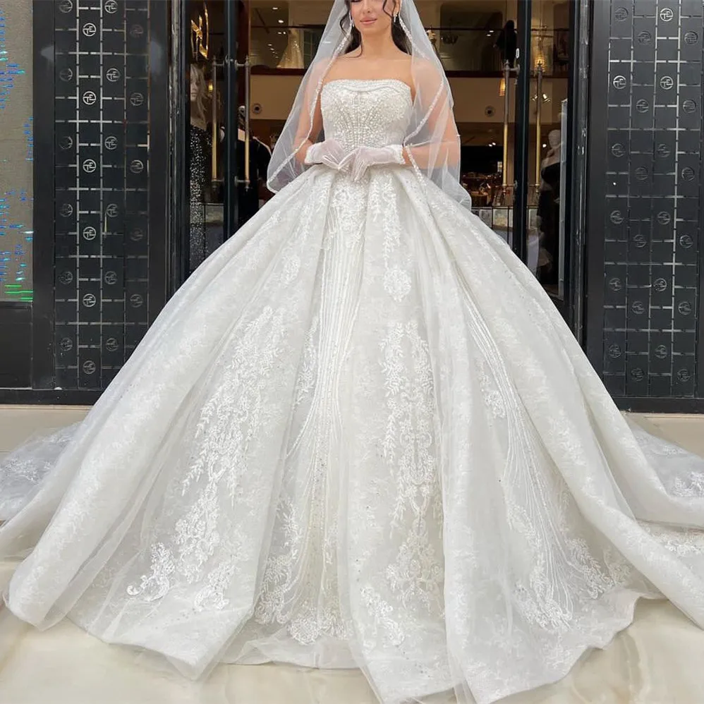 

Exquisite Ball Gown Wedding Dresses Sleeveless Bateau Sequins Ruffles Pearls Appliques Beaded Lace Bridal Gowns Vestina De Novia