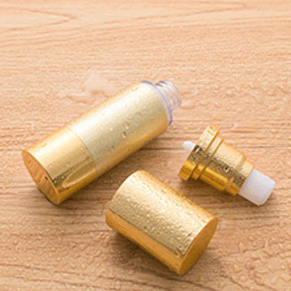 30ml&50ml capacity gold color round shape acrylic material alumite Vacuum lotion bottle with duckbilled pump and cap 6