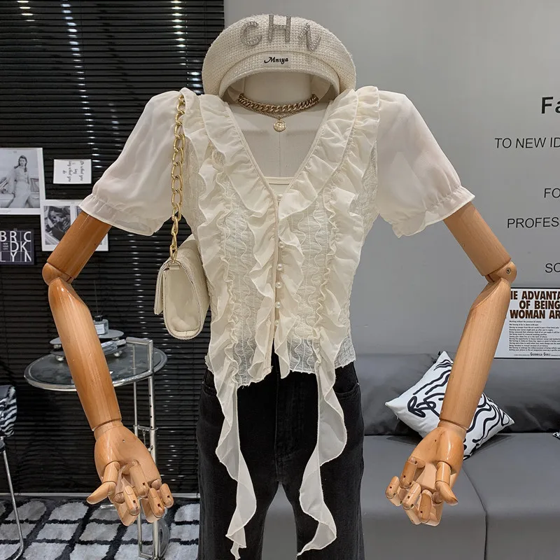 

Элегантные и милые гофрированные края, v-образный вырез, расклешенные рукава. Женская винтажная рубашка с однотонными подтяжками