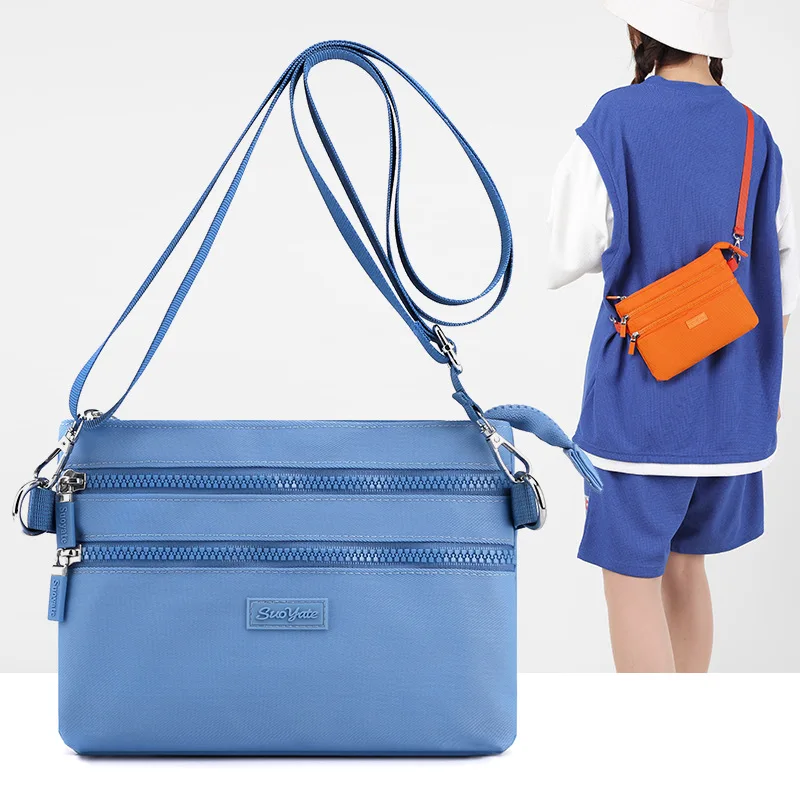 

New Crossbody Nylon Fabric Bag Single Shoulder Korean Multi layer Envelope Small Backpack Candy Small Design Sense Women's Bag