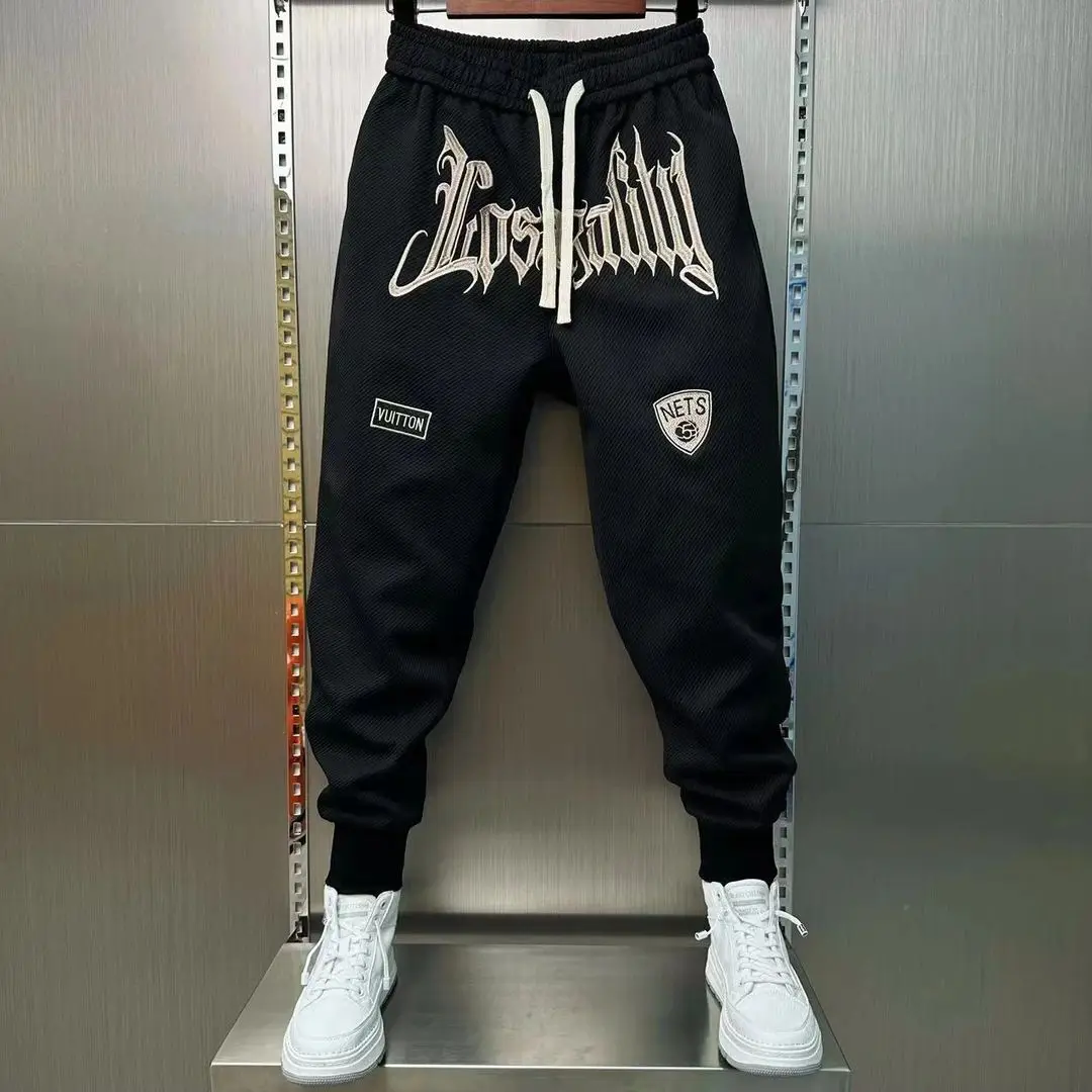 2024 Spring and Autumn Men's Loose Elastic Lace Up Embroidered Feet Pocket Casual Fashion Elegant Commuter Pants Harlan Pants