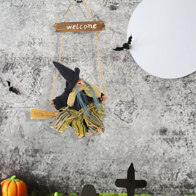 ほうきとハロウィーンホラー魔女人形空飛ぶ魔女ゴースト