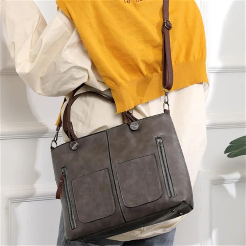 Retro leather handbag with two zipper pockets, versatile tote and crossbody style, classic women’s work and business bag. gray 01