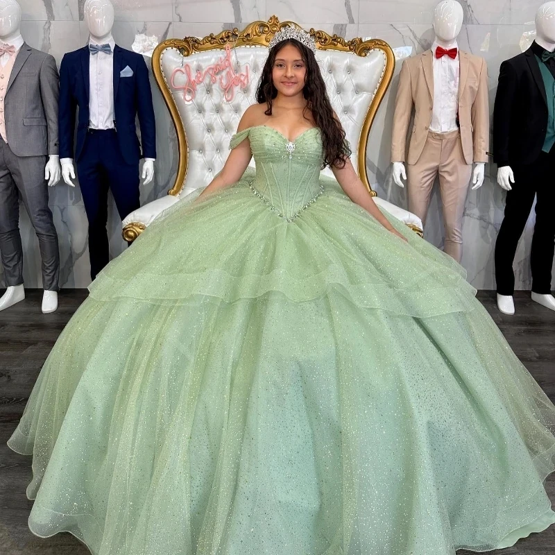 

Блестящее зеленое платье ANGELSBRIDEP для Quinceanera с бантом и открытыми плечами, платья для 15 лет, корсет, официальный костюм для вечеринки в честь Дня Рождения, выпускного вечера