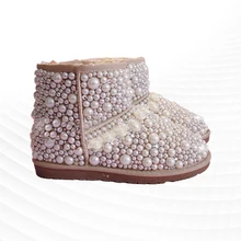  White fur integrated stitching pearl and leg boots plus velvet plus cotton warm and comfortable handmade pearl snow 35-44 