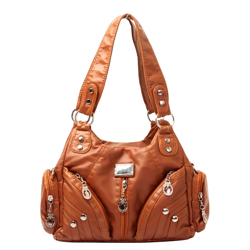 thumbnail image 1 of Mochila de hombro versátil de gran capacidad con remaches para mujer, portátil, oblicua, estilo retro, de cuero lavado, informal, 1 of 5