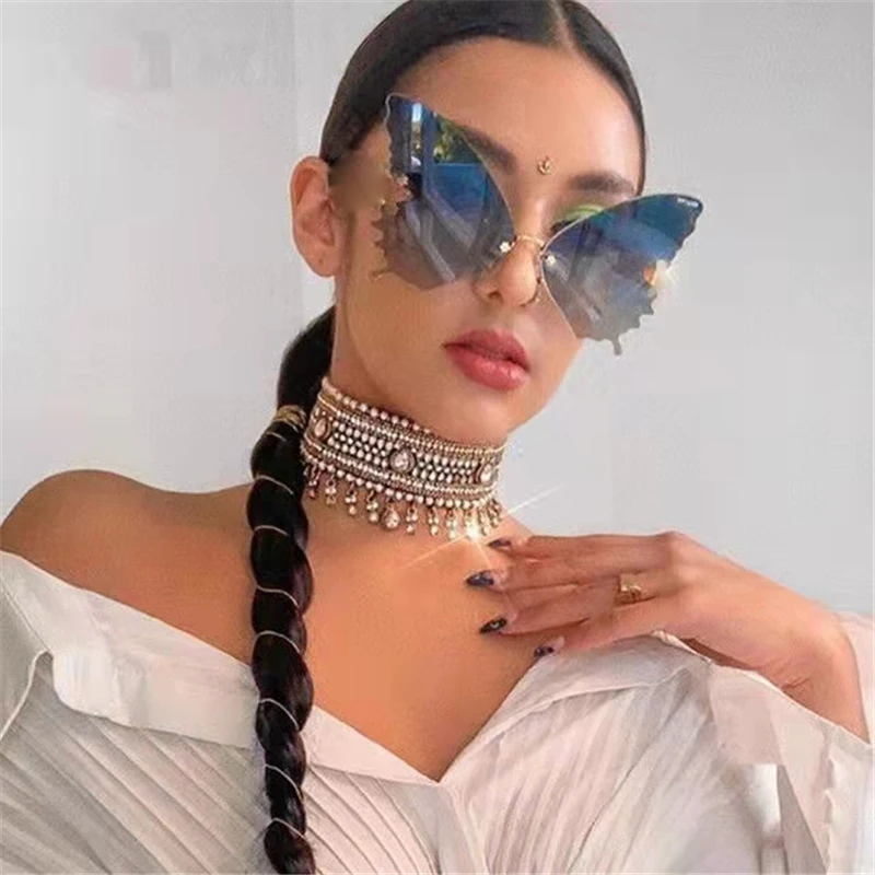 

Ladies Butterfly Sunglasses Frameless Ocean Sunglasses European and American Personality Large Frame Sunglasses