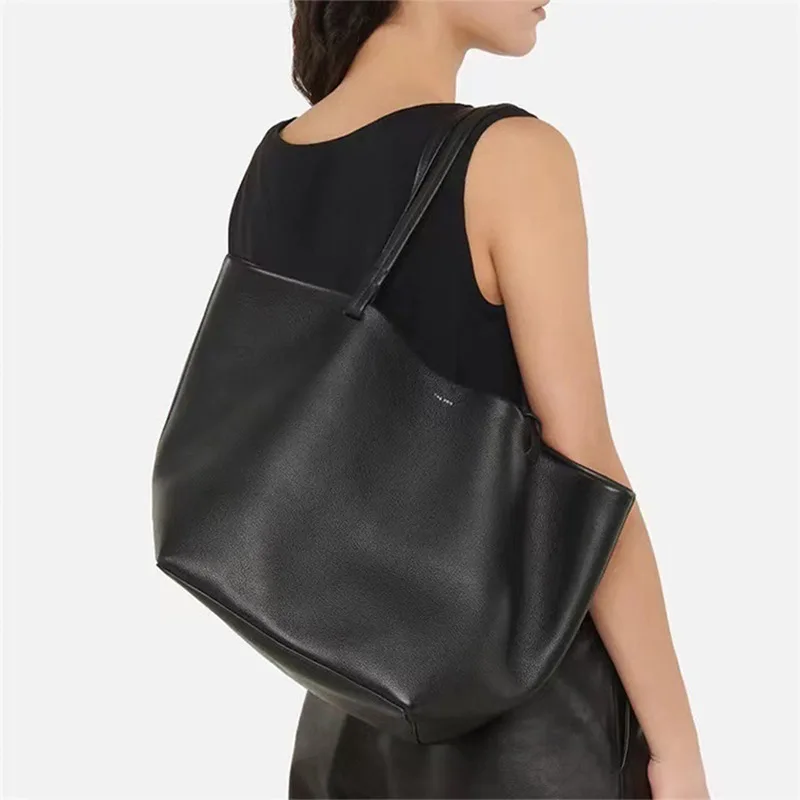 

The * Row Cowhide Handheld One Shoulder Mother Bag Fashion Simple Commuter Bag Large Capacity Tote Bag Women's Bag