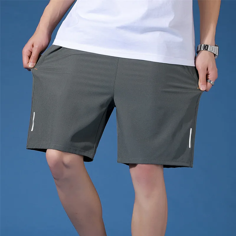 Summer 2024 men's reflective zipper ice silk pants five pants men's shorts sports casual plus size ice shorts.
