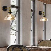 La salle à manger décorée avec des luminaires en verre Les chambres modernes sont des appliques murales vintage gris ambre clair et transparent 2
