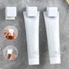 1-20PCS Toothpaste Holder Wall-mounted Face Wash Hanging Clip Self-Adhesive Toothpaste Clip Storage Rack Bathroom Accessories 1