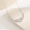 Collier pendentif ailes d'ange en or brillant, luxueux et exquis, entièrement serti de zircon, pour femmes, accessoires de bijoux de créateur de mode