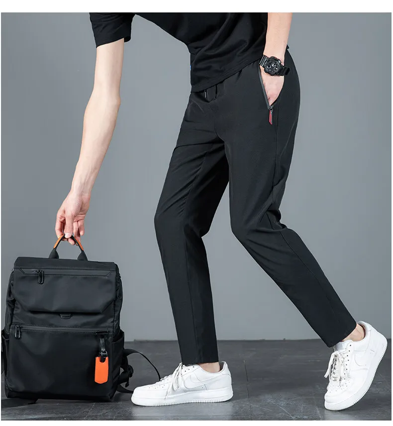 casual pants New Arrival Men's Elastic Waist Elastic Quick Drying Fabric Trousers Men Solid Harem Pant Ankle Length Thin Pants Male 918 casual joggers