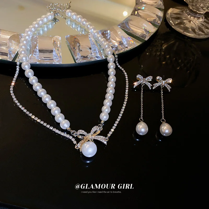 

Diamond bowknot pearl double layer necklace new light luxury clavicle chain high sense of fashion collar free shipping