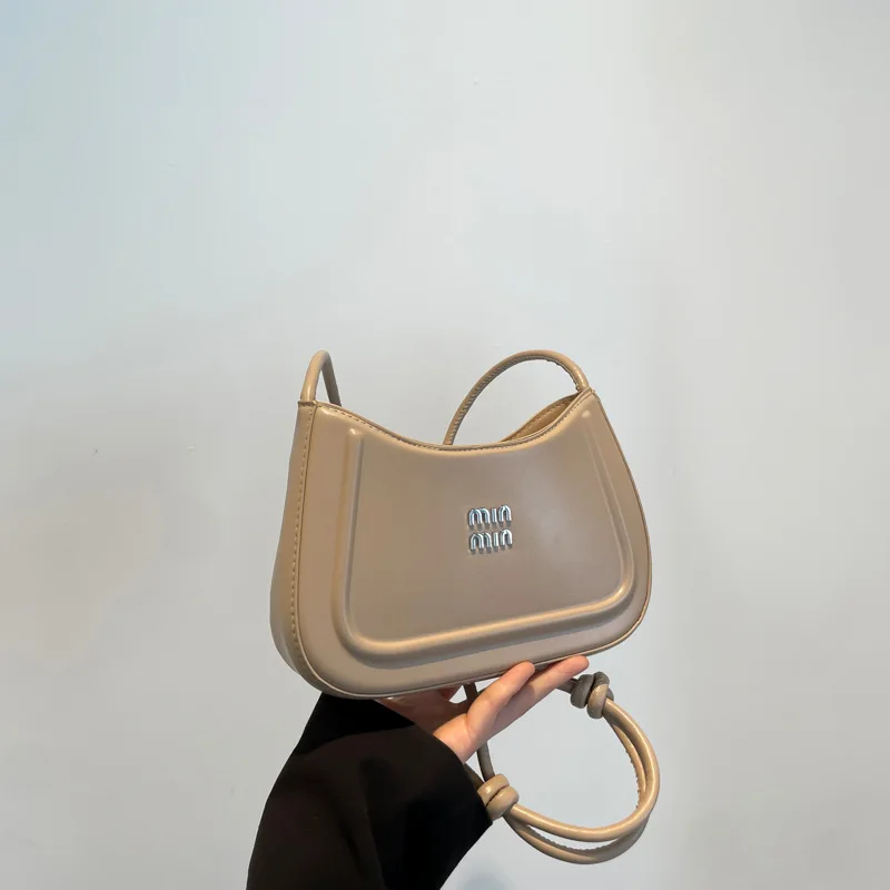 2025 nova forma de lua commuter crossbody saco simples elegante feminino axilas saco alto valor estético rua tendência material do plutônio