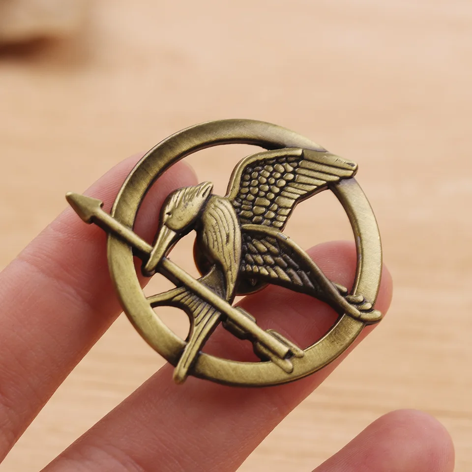 Broche de jogos vorazes vintage, emblemas de liga estilo mockingbird para  crianças, amigos, presente da moda - AliExpress, image size:960x960